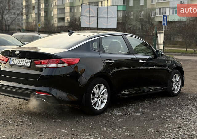 Чорний Кіа Оптіма, об'ємом двигуна 2.4 л та пробігом 129 тис. км за 10300 $, фото 4 на Automoto.ua