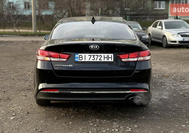 Чорний Кіа Оптіма, об'ємом двигуна 2.4 л та пробігом 129 тис. км за 10300 $, фото 5 на Automoto.ua