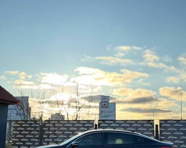 Черный Киа Оптима, объемом двигателя 2.36 л и пробегом 96 тыс. км за 11950 $, фото 2 на Automoto.ua