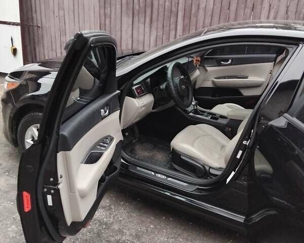 Черный Киа Оптима, объемом двигателя 2.4 л и пробегом 113 тыс. км за 11700 $, фото 13 на Automoto.ua