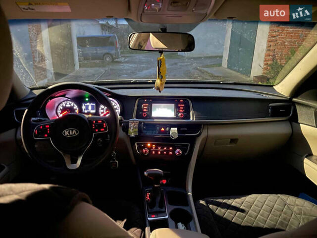 Черный Киа Оптима, объемом двигателя 2.36 л и пробегом 110 тыс. км за 10400 $, фото 7 на Automoto.ua