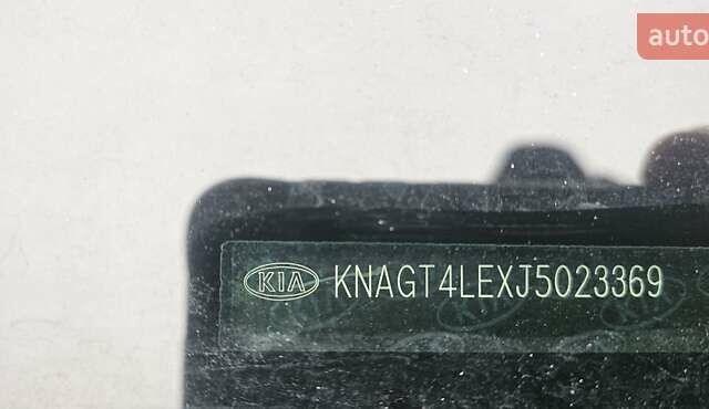 Черный Киа Оптима, объемом двигателя 2 л и пробегом 235 тыс. км за 10800 $, фото 1 на Automoto.ua