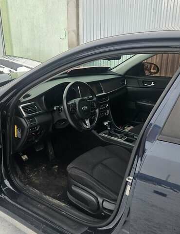 Черный Киа Оптима, объемом двигателя 2 л и пробегом 235 тыс. км за 10800 $, фото 5 на Automoto.ua