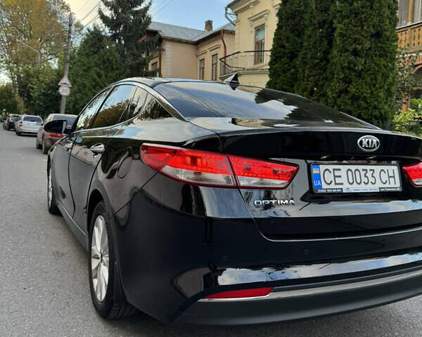 Чорний Кіа Оптіма, об'ємом двигуна 2.4 л та пробігом 89 тис. км за 13800 $, фото 26 на Automoto.ua