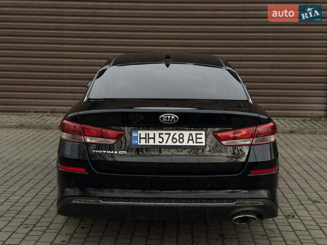 Черный Киа Оптима, объемом двигателя 2.36 л и пробегом 129 тыс. км за 9950 $, фото 5 на Automoto.ua