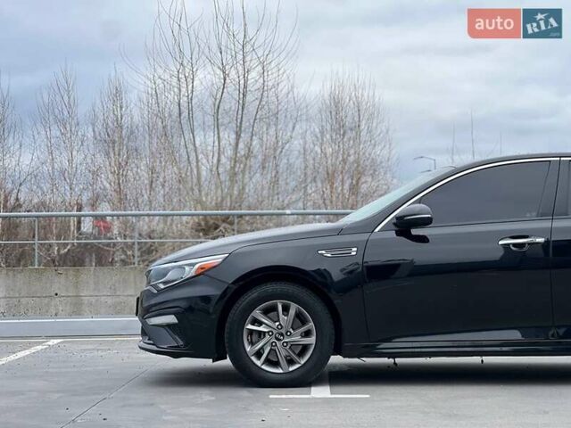 Черный Киа Оптима, объемом двигателя 2.36 л и пробегом 235 тыс. км за 11500 $, фото 7 на Automoto.ua