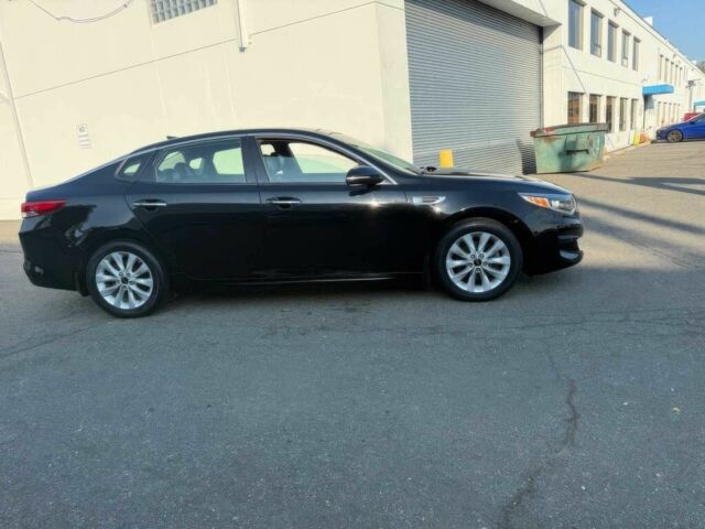 Чорний Кіа Оптіма, об'ємом двигуна 2.4 л та пробігом 36 тис. км за 2600 $, фото 5 на Automoto.ua