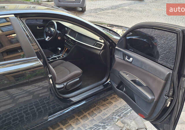 Чорний Кіа Оптіма, об'ємом двигуна 2.36 л та пробігом 240 тис. км за 11000 $, фото 9 на Automoto.ua