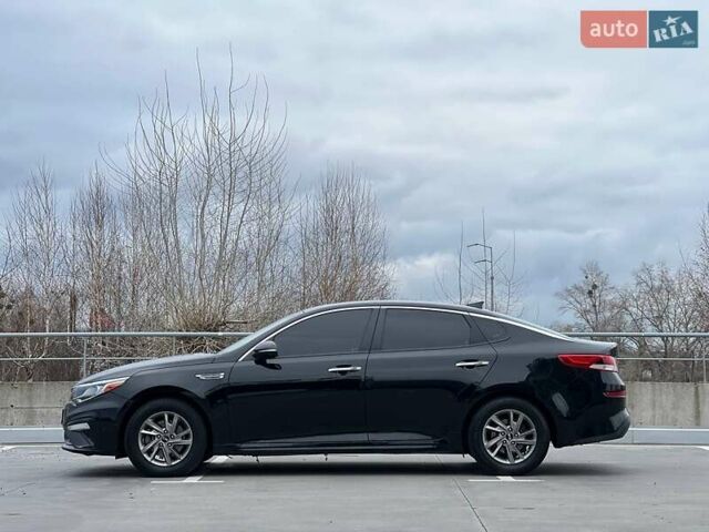 Черный Киа Оптима, объемом двигателя 2.36 л и пробегом 235 тыс. км за 11500 $, фото 6 на Automoto.ua