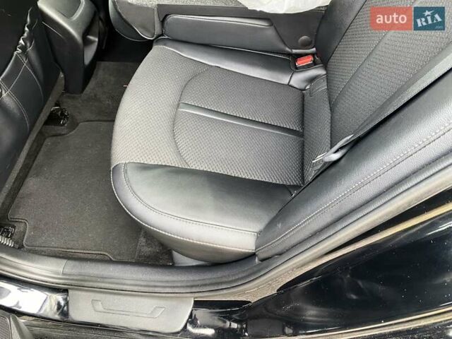Черный Киа Оптима, объемом двигателя 2.36 л и пробегом 133 тыс. км за 12800 $, фото 10 на Automoto.ua