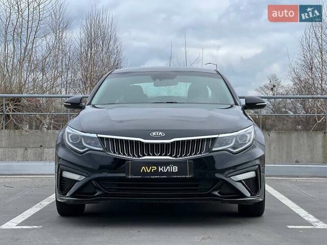 Черный Киа Оптима, объемом двигателя 2.36 л и пробегом 235 тыс. км за 11500 $, фото 3 на Automoto.ua