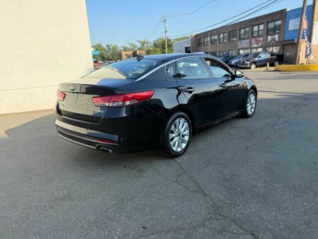 Чорний Кіа Оптіма, об'ємом двигуна 2.4 л та пробігом 36 тис. км за 2600 $, фото 4 на Automoto.ua