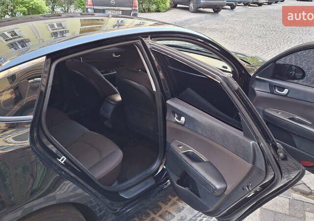 Чорний Кіа Оптіма, об'ємом двигуна 2.36 л та пробігом 240 тис. км за 11000 $, фото 10 на Automoto.ua