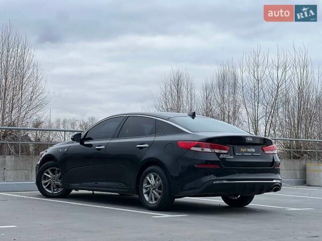 Черный Киа Оптима, объемом двигателя 2.36 л и пробегом 235 тыс. км за 11500 $, фото 9 на Automoto.ua
