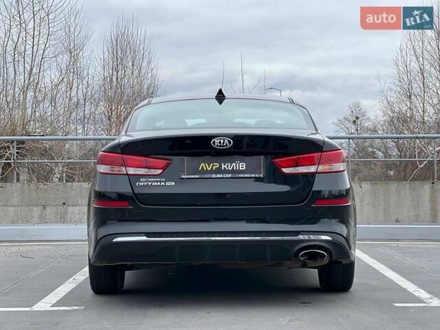Черный Киа Оптима, объемом двигателя 2.36 л и пробегом 235 тыс. км за 11500 $, фото 11 на Automoto.ua