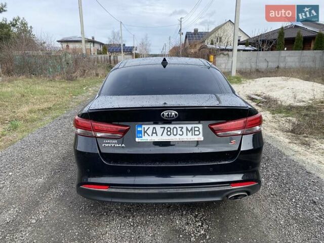 Черный Киа Оптима, объемом двигателя 2.36 л и пробегом 133 тыс. км за 12800 $, фото 4 на Automoto.ua