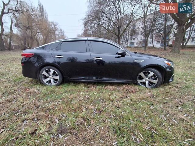 Черный Киа Оптима, объемом двигателя 2.36 л и пробегом 134 тыс. км за 14300 $, фото 1 на Automoto.ua