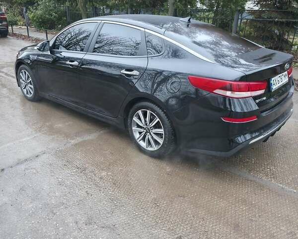 Черный Киа Оптима, объемом двигателя 2.36 л и пробегом 55 тыс. км за 14500 $, фото 5 на Automoto.ua