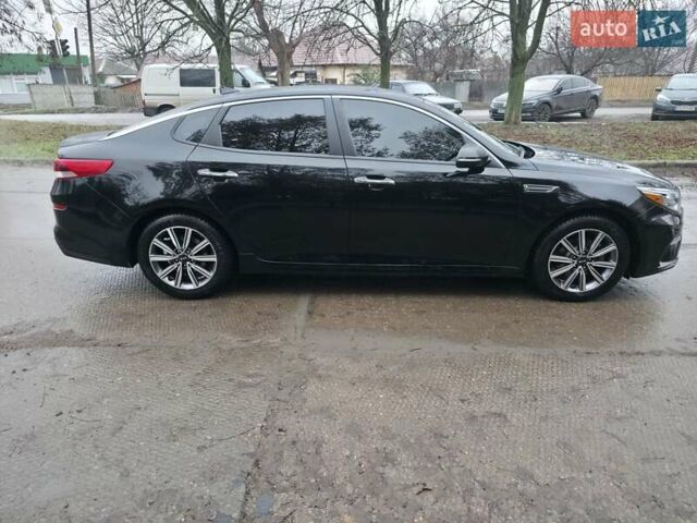 Черный Киа Оптима, объемом двигателя 2.36 л и пробегом 55 тыс. км за 14500 $, фото 4 на Automoto.ua