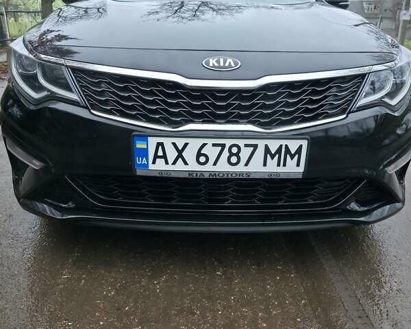 Черный Киа Оптима, объемом двигателя 2.36 л и пробегом 55 тыс. км за 14500 $, фото 1 на Automoto.ua