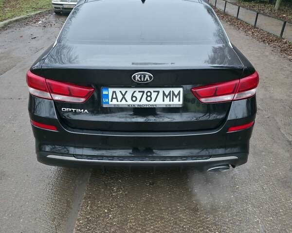 Черный Киа Оптима, объемом двигателя 2.36 л и пробегом 55 тыс. км за 14500 $, фото 2 на Automoto.ua