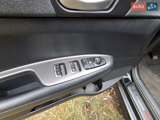 Черный Киа Оптима, объемом двигателя 2.36 л и пробегом 134 тыс. км за 14300 $, фото 6 на Automoto.ua
