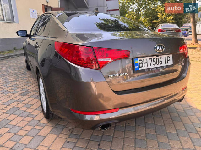 Коричневий Кіа Оптіма, об'ємом двигуна 2.4 л та пробігом 210 тис. км за 8500 $, фото 3 на Automoto.ua