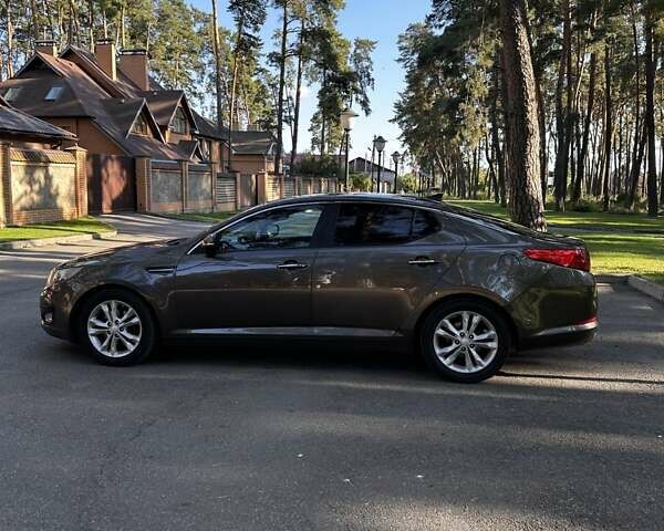 Коричневый Киа Оптима, объемом двигателя 2.4 л и пробегом 190 тыс. км за 9600 $, фото 4 на Automoto.ua