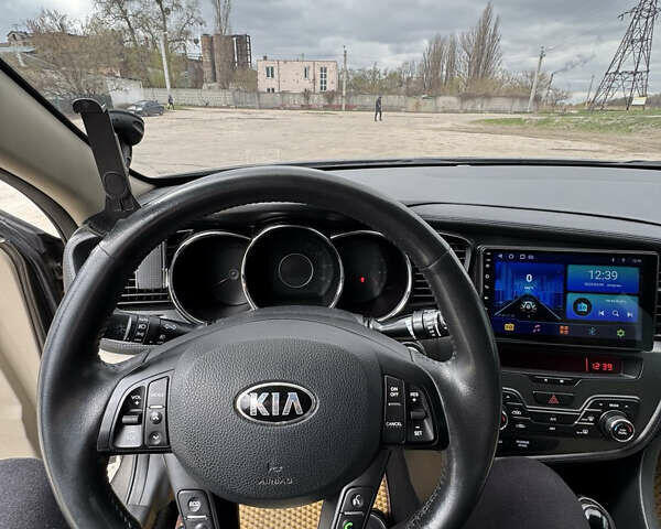 Коричневий Кіа Оптіма, об'ємом двигуна 2.4 л та пробігом 248 тис. км за 8500 $, фото 5 на Automoto.ua