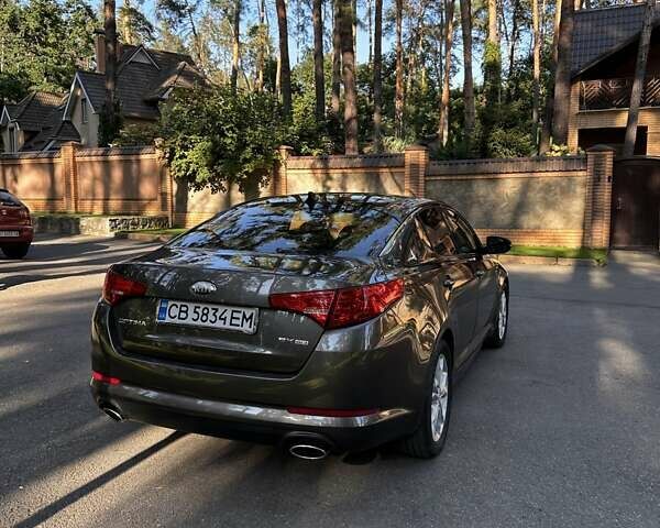 Коричневый Киа Оптима, объемом двигателя 2.4 л и пробегом 190 тыс. км за 9600 $, фото 5 на Automoto.ua