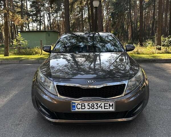 Коричневый Киа Оптима, объемом двигателя 2.4 л и пробегом 190 тыс. км за 9600 $, фото 3 на Automoto.ua