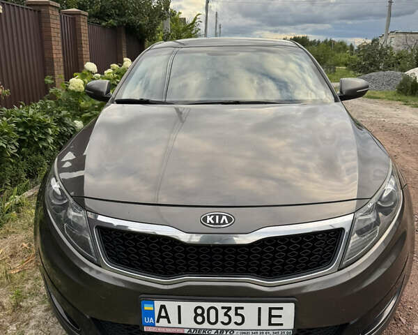 Коричневый Киа Оптима, объемом двигателя 2 л и пробегом 150 тыс. км за 8600 $, фото 4 на Automoto.ua