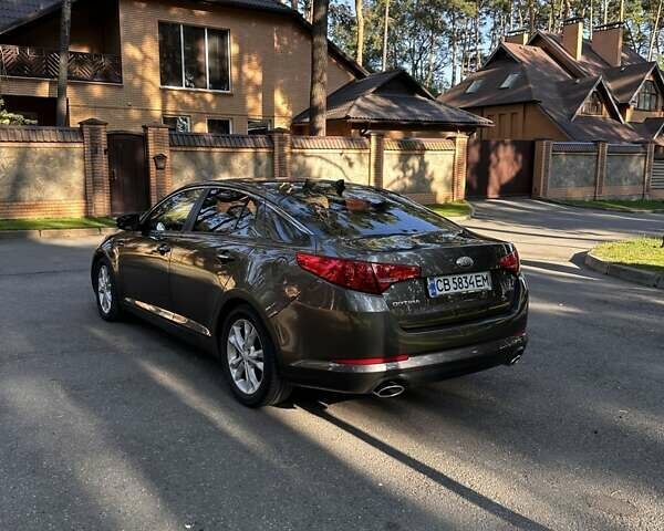 Коричневый Киа Оптима, объемом двигателя 2.4 л и пробегом 190 тыс. км за 9600 $, фото 7 на Automoto.ua
