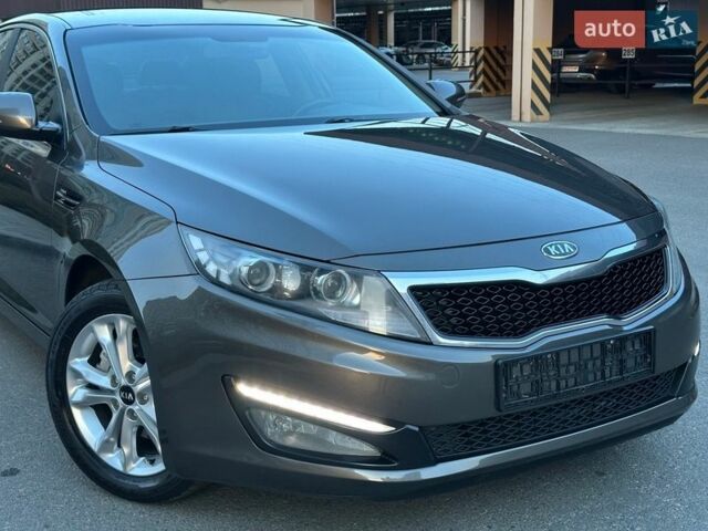 Коричневый Киа Оптима, объемом двигателя 2 л и пробегом 121 тыс. км за 11400 $, фото 14 на Automoto.ua