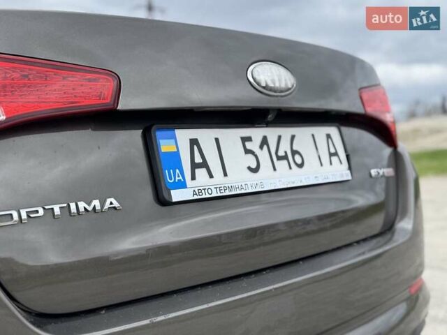 Коричневый Киа Оптима, объемом двигателя 2.4 л и пробегом 248 тыс. км за 8050 $, фото 1 на Automoto.ua