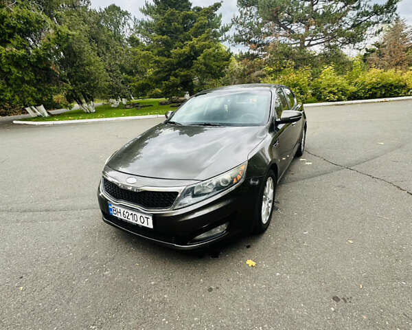 Коричневый Киа Оптима, объемом двигателя 2.36 л и пробегом 200 тыс. км за 8500 $, фото 12 на Automoto.ua
