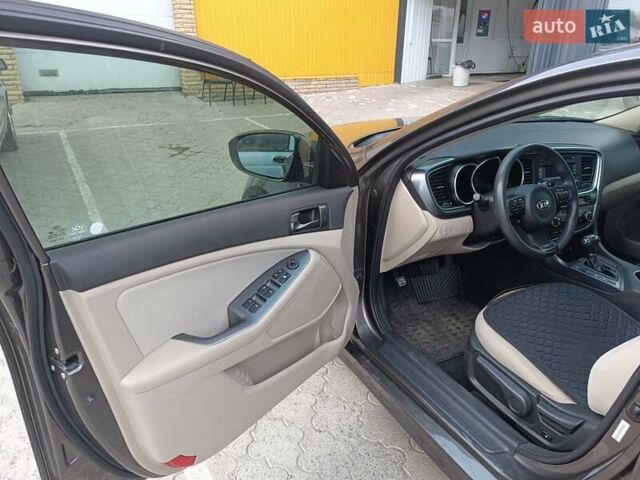 Коричневий Кіа Оптіма, об'ємом двигуна 2.36 л та пробігом 210 тис. км за 11200 $, фото 1 на Automoto.ua