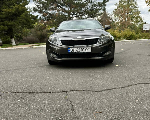 Коричневый Киа Оптима, объемом двигателя 2.36 л и пробегом 200 тыс. км за 8500 $, фото 25 на Automoto.ua
