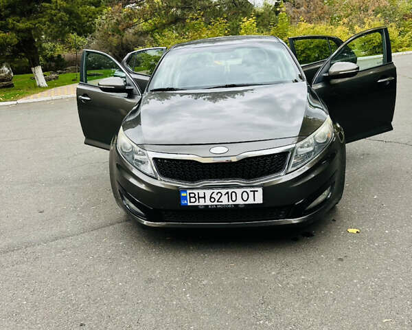 Коричневый Киа Оптима, объемом двигателя 2.36 л и пробегом 200 тыс. км за 8500 $, фото 18 на Automoto.ua