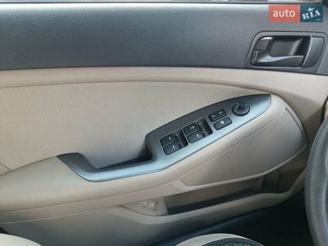 Коричневий Кіа Оптіма, об'ємом двигуна 2.36 л та пробігом 210 тис. км за 11200 $, фото 5 на Automoto.ua