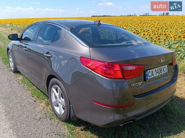 Коричневий Кіа Оптіма, об'ємом двигуна 2.36 л та пробігом 210 тис. км за 11200 $, фото 8 на Automoto.ua