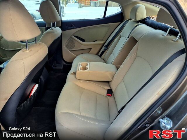 Коричневый Киа Оптима, объемом двигателя 2.4 л и пробегом 145 тыс. км за 8500 $, фото 8 на Automoto.ua