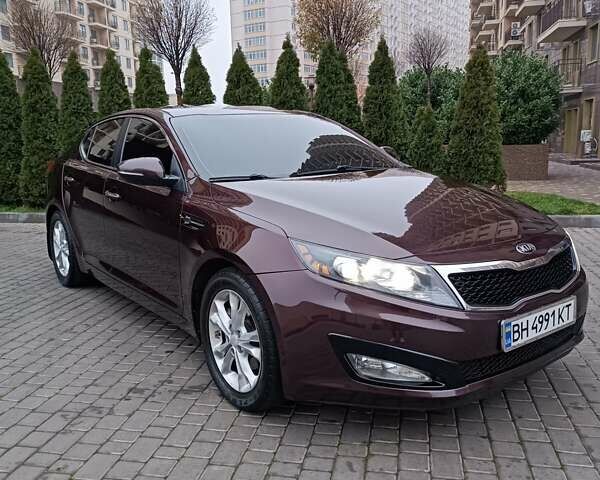 Красный Киа Оптима, объемом двигателя 2.36 л и пробегом 164 тыс. км за 10100 $, фото 2 на Automoto.ua