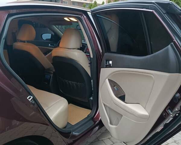 Красный Киа Оптима, объемом двигателя 2.36 л и пробегом 164 тыс. км за 10100 $, фото 14 на Automoto.ua