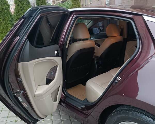 Красный Киа Оптима, объемом двигателя 2.36 л и пробегом 164 тыс. км за 10100 $, фото 12 на Automoto.ua