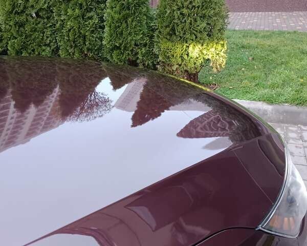 Красный Киа Оптима, объемом двигателя 2.36 л и пробегом 164 тыс. км за 10100 $, фото 17 на Automoto.ua