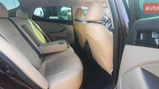 Червоний Кіа Оптіма, об'ємом двигуна 2.4 л та пробігом 113 тис. км за 10000 $, фото 14 на Automoto.ua