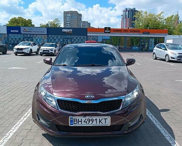 Красный Киа Оптима, объемом двигателя 2.36 л и пробегом 160 тыс. км за 10500 $, фото 7 на Automoto.ua