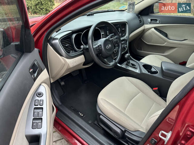 Красный Киа Оптима, объемом двигателя 2.36 л и пробегом 189 тыс. км за 8850 $, фото 6 на Automoto.ua