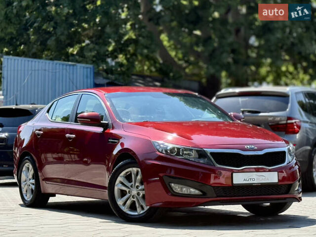 Червоний Кіа Оптіма, об'ємом двигуна 2.36 л та пробігом 198 тис. км за 9900 $, фото 19 на Automoto.ua